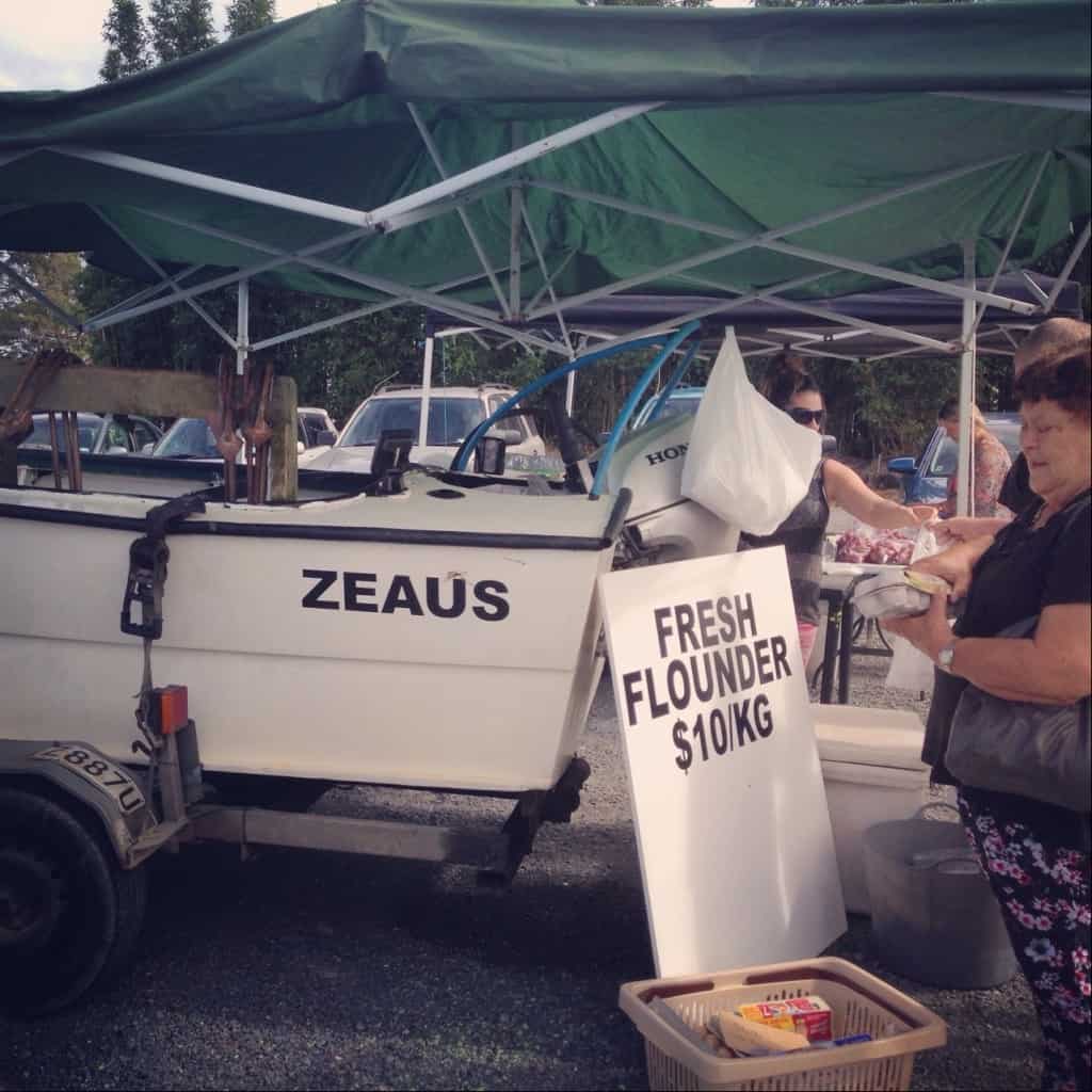 These stallholders were out fishing that morning, and brought their catch straight to the market on their boat!